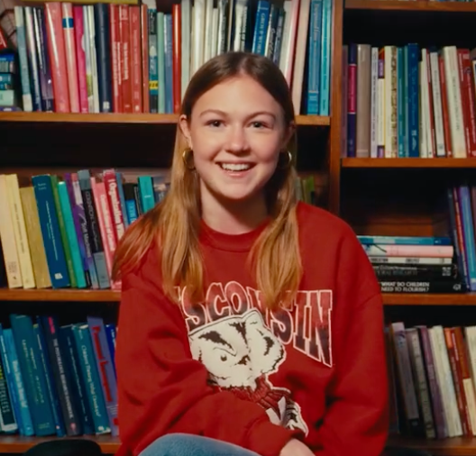 Photo of Taylor in a library